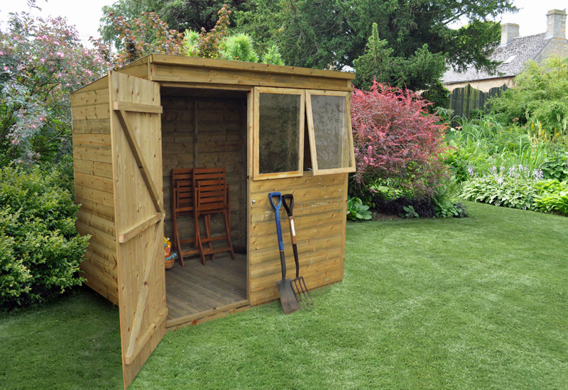 Pent tongue & groove shed in garden