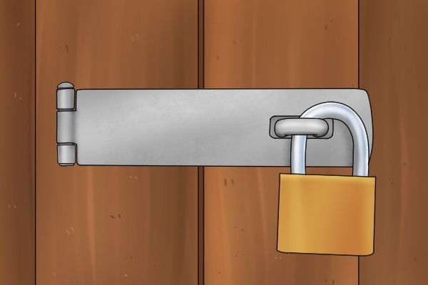 Padlock on door denoting security