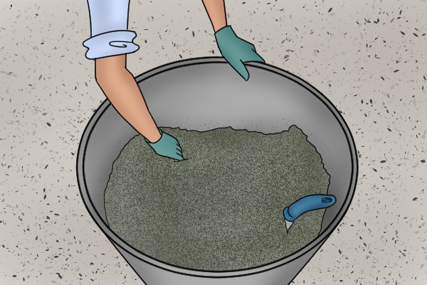 Mixing cement in bucket
