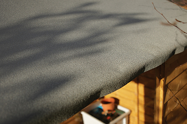 Felt roof on shed close-up