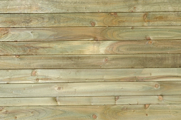 Green pressure-treated wooden boards