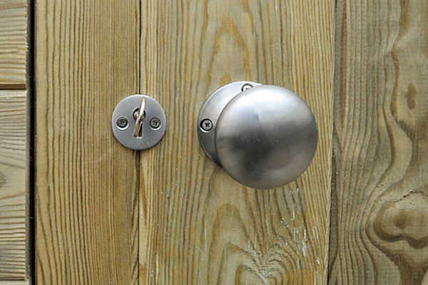 Lock and doorknob on shed door
