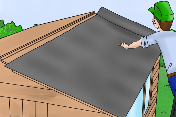 Putting felt on shed roof