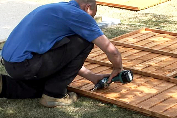 Pre-drilling pilot holes on shed panels